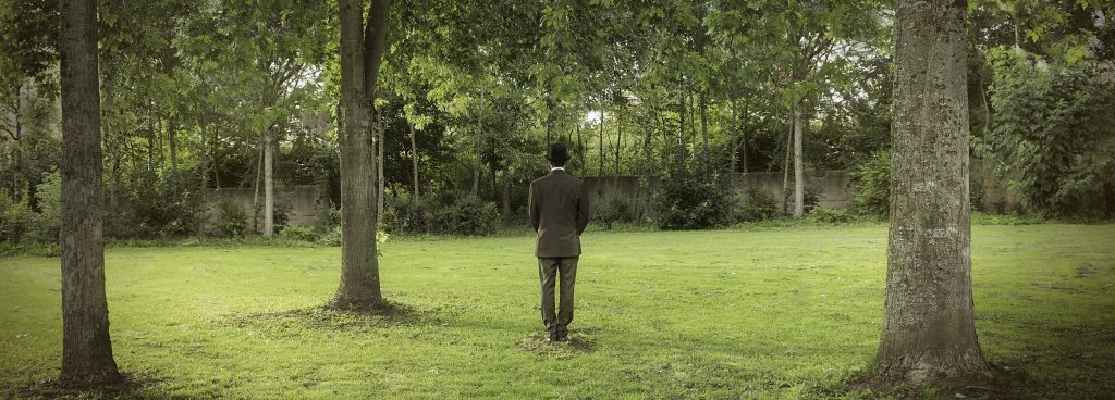 Man with Hat - Lost in between trees