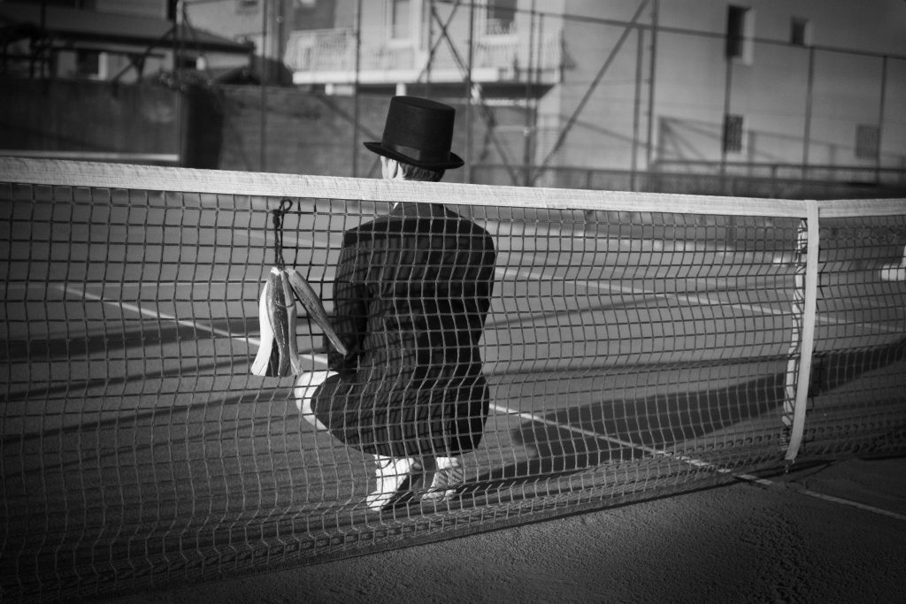 Man with Hat - Tennis court 3